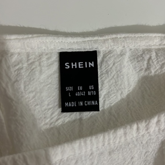 White romper with ruffle sleeves - Picture 6 of 6